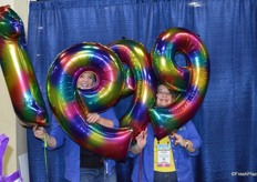 Having fun with the 1999 theme are Heather Miller and Debra Cox May with the Florida Department of Agriculture.
